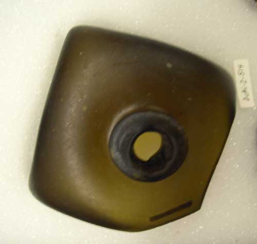 Case bottle for wine - Square bottles first appeared in the early 17th century.  They were made by blowing glass into a square-sided mold.  The shape allowed for easy packing in cases of a dozen bottles to a case.  From shipwreck in Trinity Harbour.