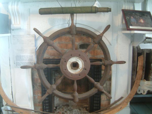 Schooner wheel, located in the Trinity Museum, Trinity, NL, Canada.