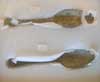 Large table spoons made from pewter.  The metal is now corroded from exposure to sea water.  From shipwreck in Trinity Harbour.
